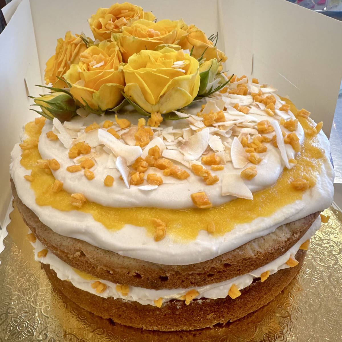Layer cake with yellow roses